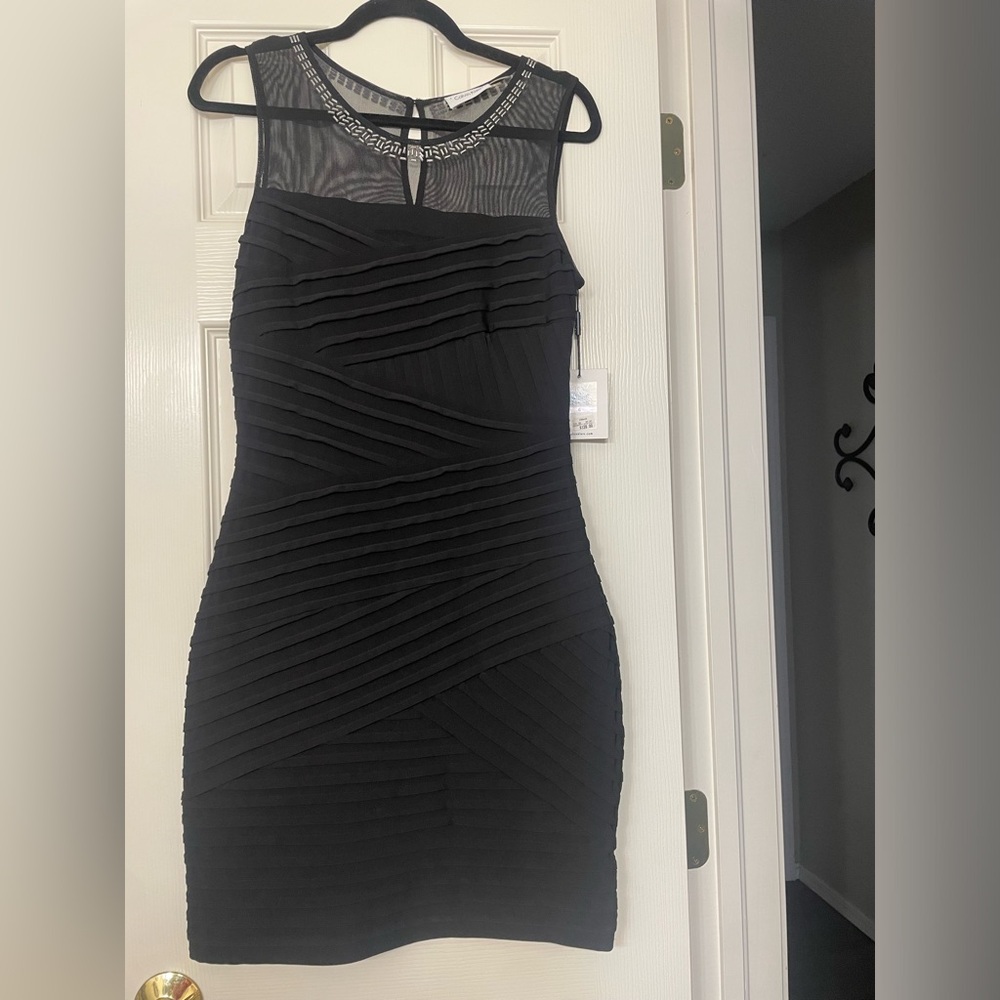 Calvin Klein semi formal/ wedding guest/party  black dress. Size 6. NWT